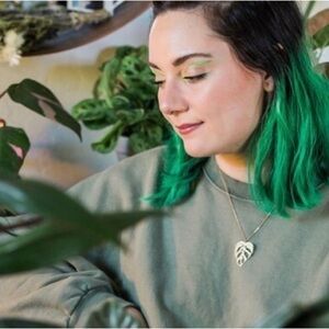 A Tea Leaf Monstera Adansonii Leaf necklace